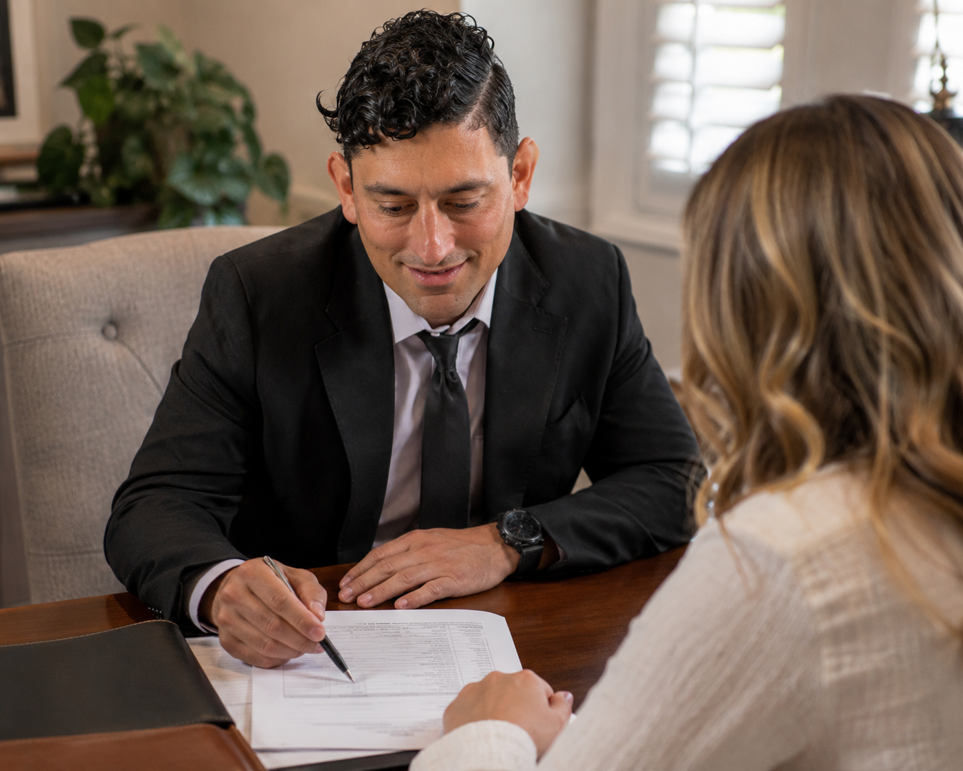 Savannah REALTOR Alex Rodino reviewing home-selling costs with a seller during a listing consultation