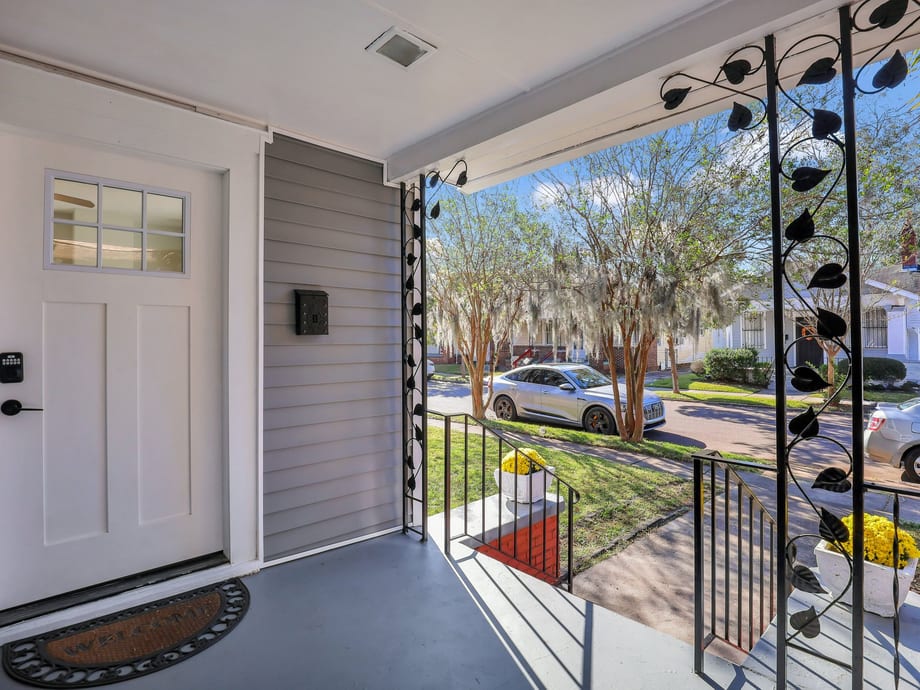 Covered front porch and entrance of a classic Savannah home in the Baldwin Park area, GA