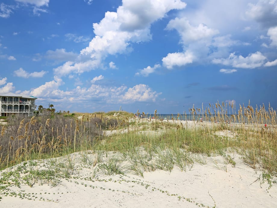 Wide Atlantic beach on Tybee Island, GA with gentle surf and open sand
